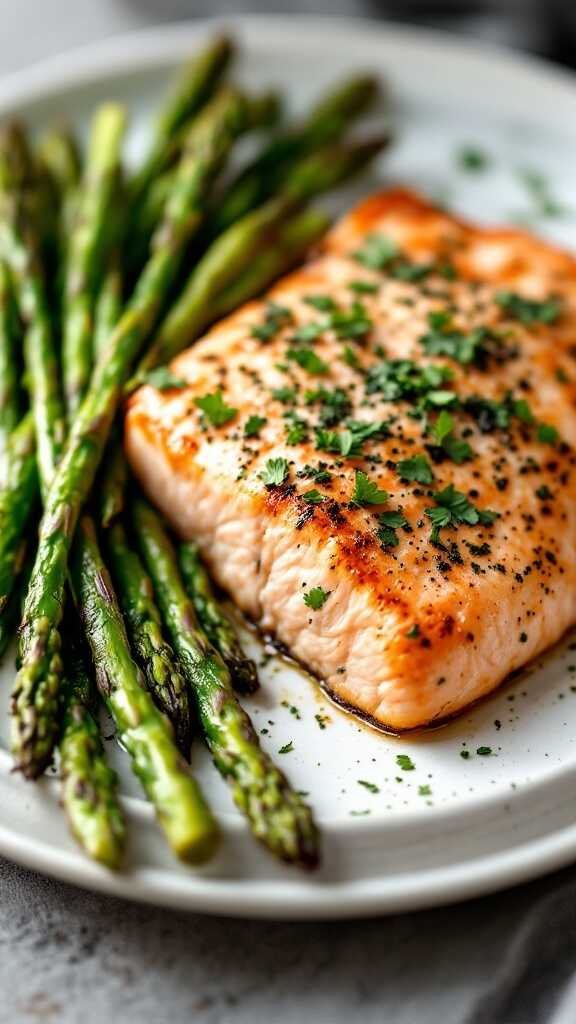 A plate of herb-crusted salmon with asparagus, garnished with herbs.