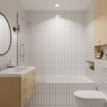 A modern bathroom with white subway tiles, a wooden vanity with a round mirror, and a bathtub. Ambient lighting creates a clean, minimalist atmosphere.