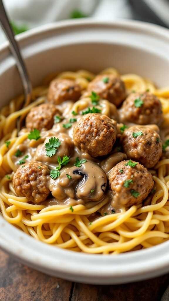 A bowl of vegan meatball stroganoff with pasta and garnished with parsley.