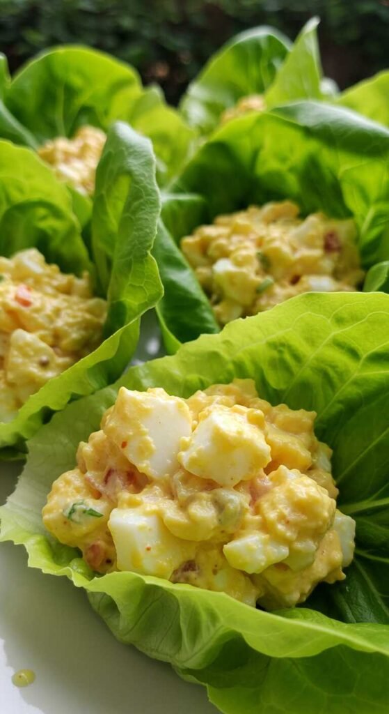 Egg salad served in lettuce cups with paprika and herbs