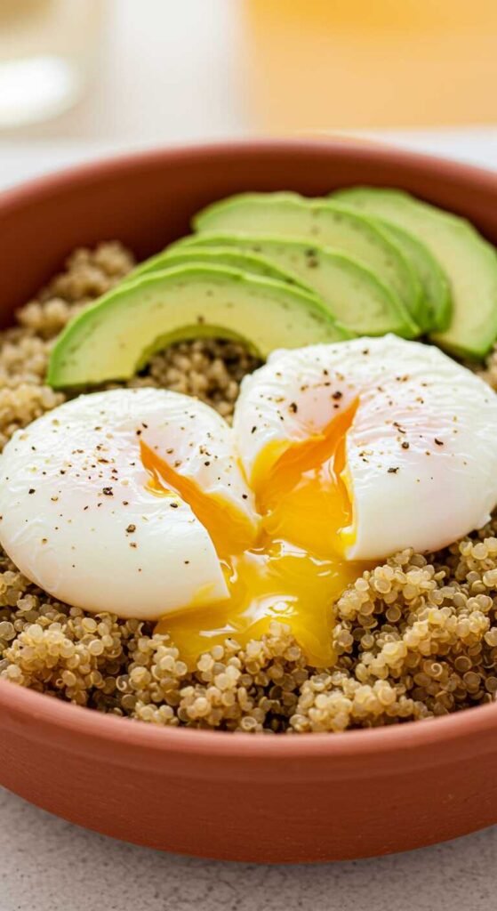 Savory Quinoa Bowl with Eggs featuring quinoa, avocado, and a runny poached egg