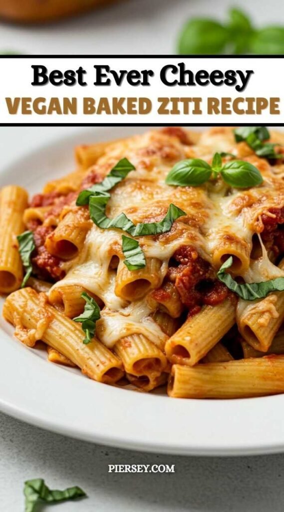 Plate of vegan baked ziti, topped with melted cheese and fresh basil. Text reads "Best Ever Cheesy Vegan Baked Ziti Recipe." Cozy, appetizing feel.