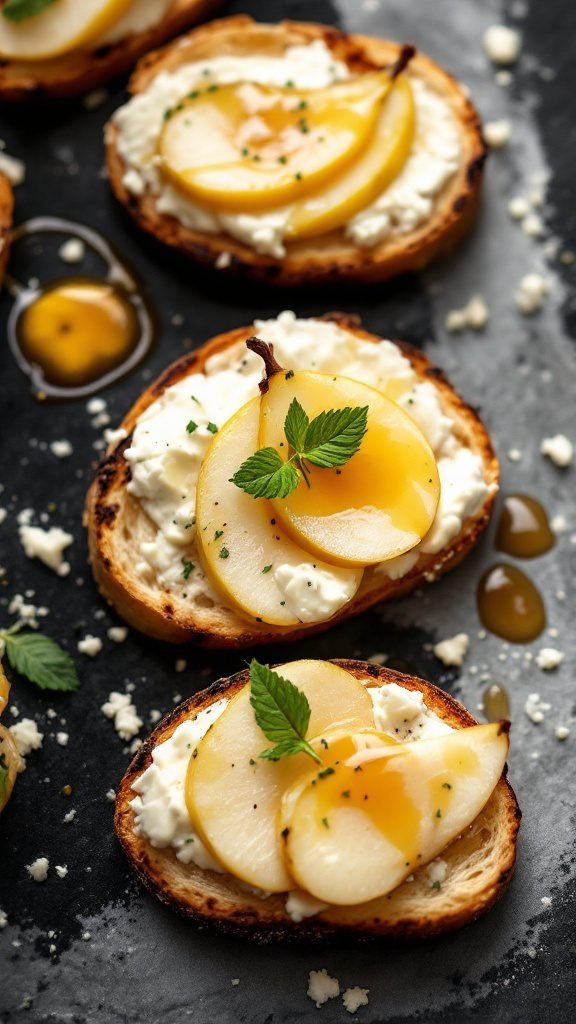 Delicious pear and gorgonzola crostini on toasted bread with mint garnish.